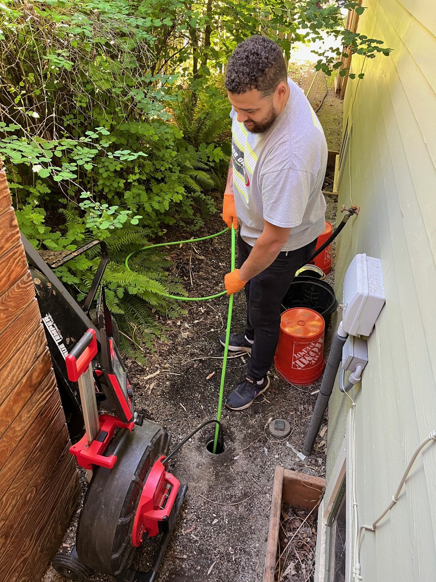 Bob Oates technician hydro jetting a sewer line in Seattle