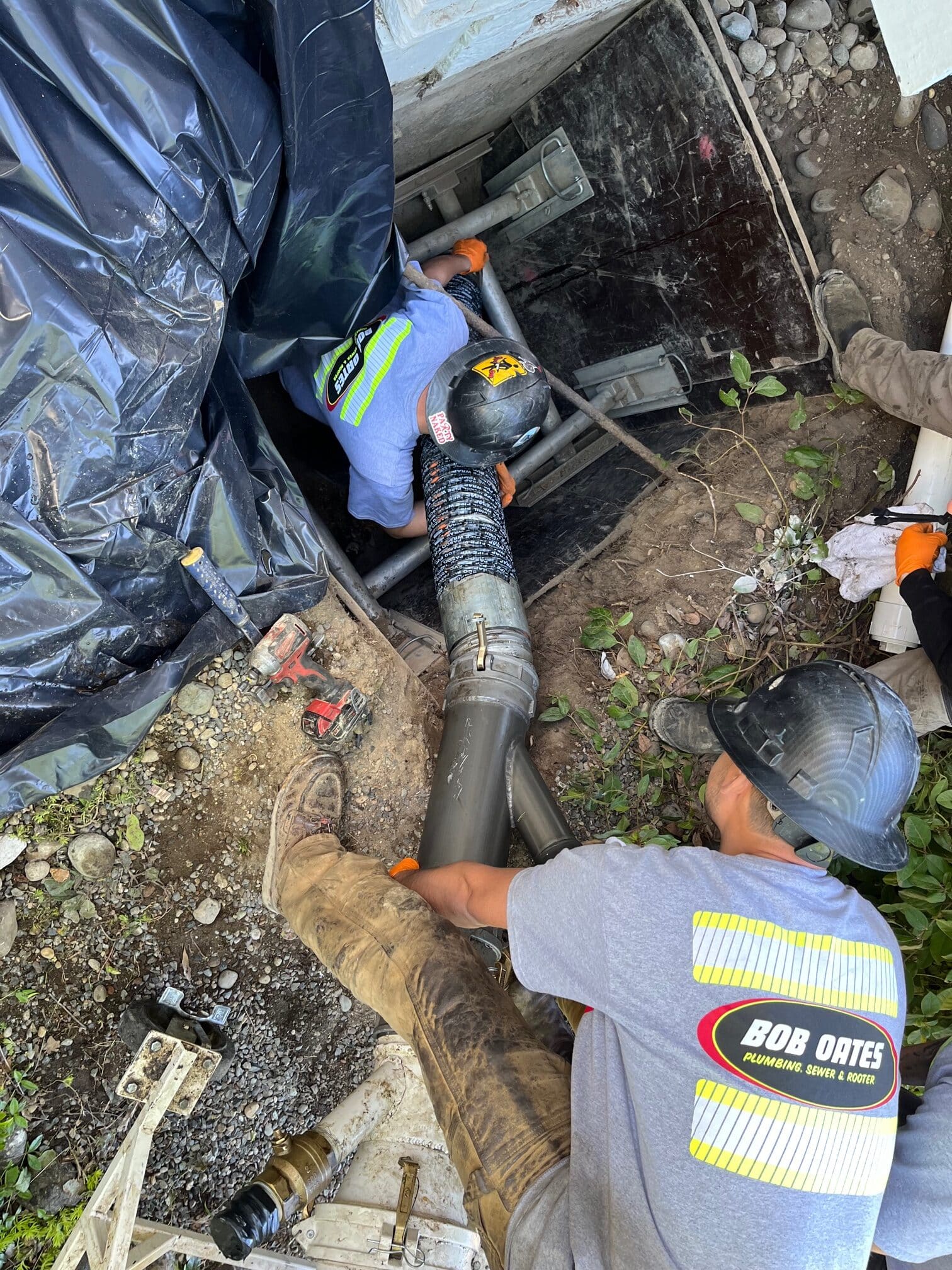 Bob Oates techs completing a CIPP sewer lining and cleanout